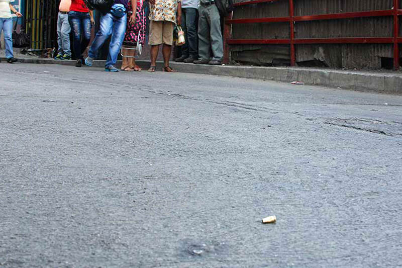 cola-supermercado-disparos-asesinato