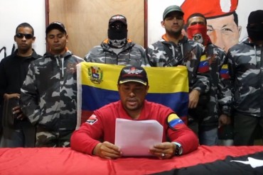 ¡ATENCIÓN! Colectivo chavista amenaza a opositores por retirar los retratos de Chávez y Bolívar