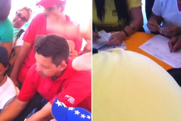 ¡SIN MIEDO! Empleados del gobierno (con uniforme rojito) firmaron en contra de Maduro