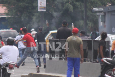 ¡HORROR! Un fallecido y varios heridos tras brutal arremetida de colectivos armados en Catia (+Rompieron cuadernos)