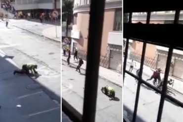 ¡VEA! El momento en el que un grupo de manifestantes salvaron a un policía de ser linchado en Colombia (+Video)