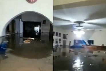 ¡TRISTEZA TOTAL! Hombre descuelga cuadros y recuerdos familiares de su vivienda inundada en Maracay: el agua le llega casi al cuello (+Video impresionante)