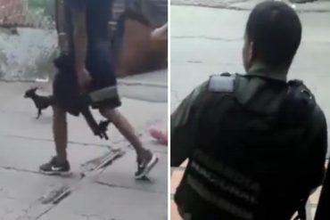 ¡AH, CARAMBA! A plena luz del día y al frente de un militar del régimen: así se pasean sujetos por las calles con armas de alto calibre (+Video)