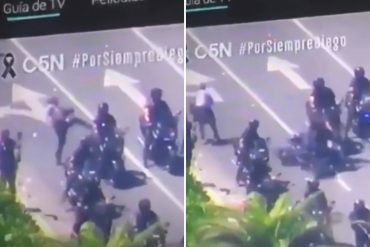 ¡DESASTROSO! Un hincha de Maradona pateó a un policía y lo tiró de la moto durante disturbios en pleno velatorio en la Casa Rosada (+Video)