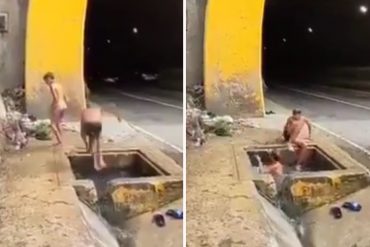 ¡MUY MAL! Los peligrosos clavados que hacen niños sobre una alcantarilla en Catia que usan como “piscina” (+Video)