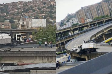 Vehículo de carga quedó colgando en la defensa del Distribuidor La Araña en Caracas (+Fotos)